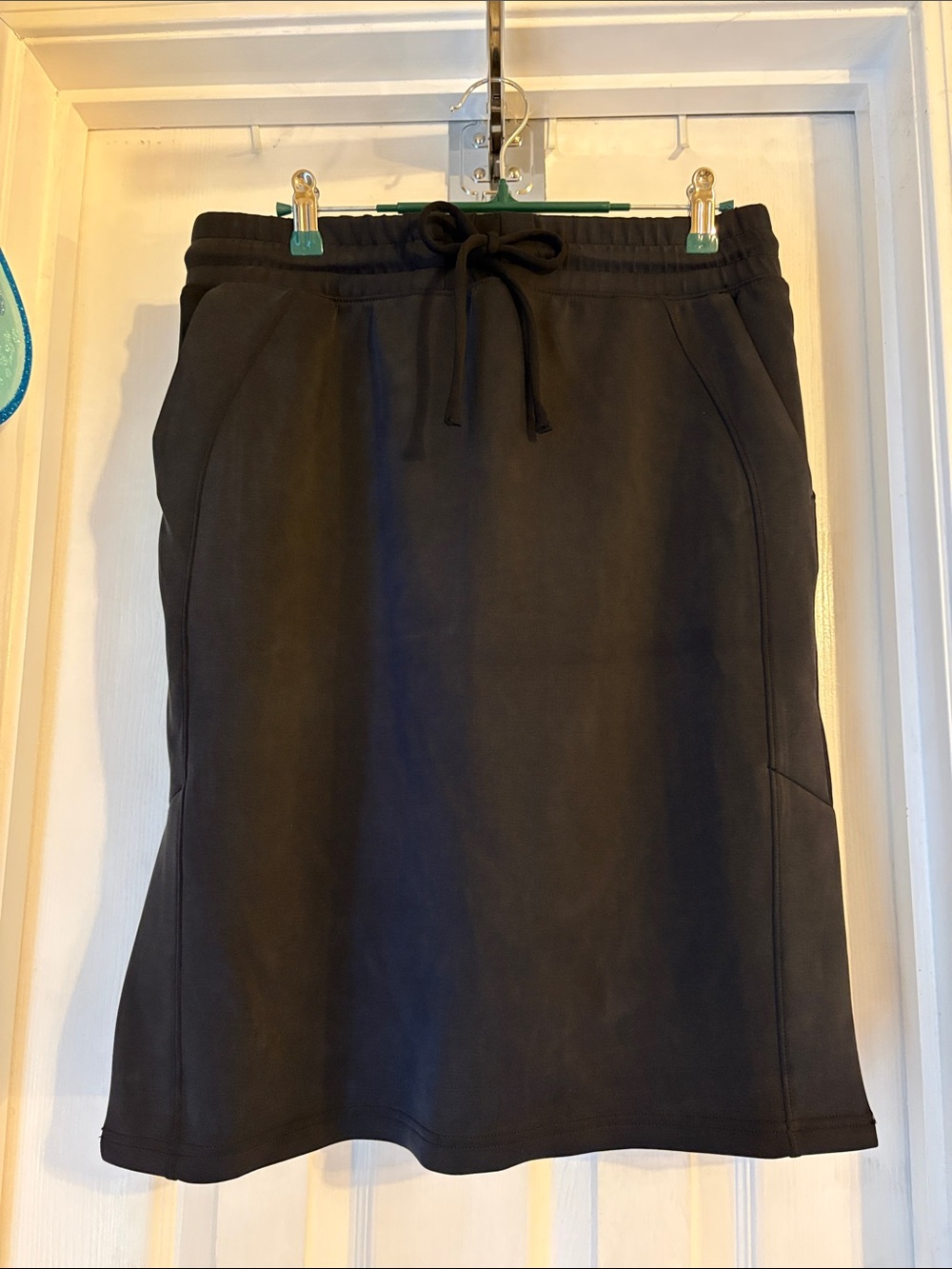 FLX Solace black midi skirt women’s size medium.